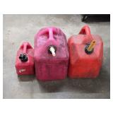 3 Gas Cans - Two Are Partially Full