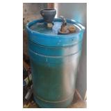 Plastic barrel with used oil. 18 x 32