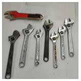 Adjustable wrenches