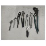 Adjustable wrenches