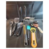 Assorted kitchen utensils,  knife sharpener