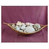 Boat shaped basket with sea shells