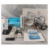 Wii console with Wii Sports Resort, remote and
