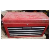 Red metal tool box with contents. Needs a key for