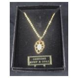 Genuine Ruby and Opal necklace on gold colored