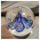 Hand blown large blue and white paper weight. 4"