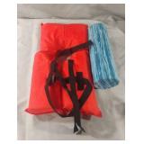 Childs life jacket and a water exercise bouy