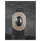 Ring with Black Center Stone (Onyx?) and