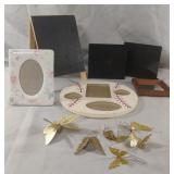Photo frames, decorative butterflies, book ends