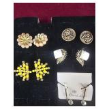 Group of vintage clip-on and screwback earrings