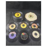 Stack of 45 records - mostly Motown artists,