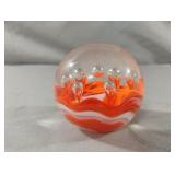 Glass paperweight orange and white