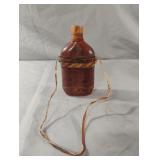 Vintage leather-wrapped glass flask