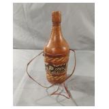 Vintage leather-wrapped glass bottle