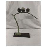 Toyo bronze sculpture of three birds on a branch.
