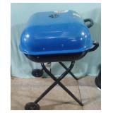 Charcoal portable grill. Needs a screw