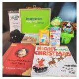 Assorted kids toys, books, and flashlight cards