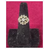 18kt H.G.E ring with clear and yellow tinted stone