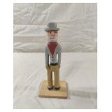 Vintage hand-carved folk art wooden figure.