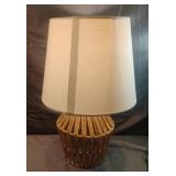 Woven lamp. Works. 15 1/2" tall