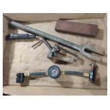 Sharpening stone, pulley puller, guage and