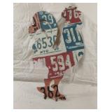 Rooster-shaped "license plate" metal sculpture