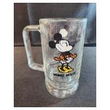 vintage clear glass beer mug or stein featuring