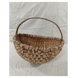 Handmade woven basket with handle