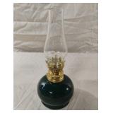 Hand blown green glass miniature oil lamp. Needs
