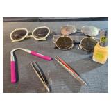 Tweezers, nail polish, sunglasses