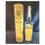 Empty bottle and a storage tube for Colonel E.H.