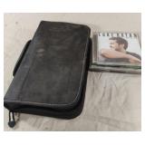 CDs in a case including Luke Bryan, Alan Jackson,