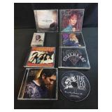 Assorted CDs and cassette, Reba, steelheart.