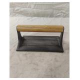 Cast iron bacon press