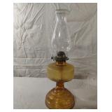 Vintage amber glass oil lamp