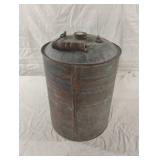 Vintage rustic metal fuel can