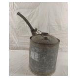 Vintage galvanized metal fuel can with nozzle