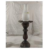 Vintage electric wooden lamp with a metal base