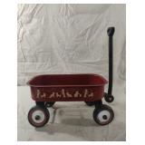 Vintage red metal doll wagon