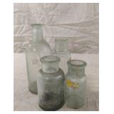 Vintage greenish glass bottles