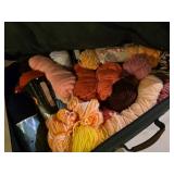 Suitcase of yarn, zipper is broken on suitcase