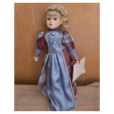 18' Tara vintage porcelain doll dressed in a