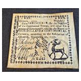 replica of a 1777 Georgia four-dollar colonial