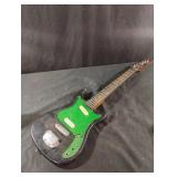 Camo electric Guitar E200. Needs repairs