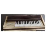 Vintage Estey electric chord organ