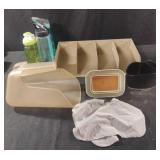 Plastic scoop, metal organizer, water bottles and