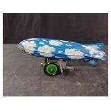 Vintage tin wind-up Schylling Stealth Zeppelin