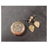 Gold tone locket and earrings