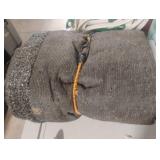 Indoor/Outdoor black carpet. Possibly 8 x 10