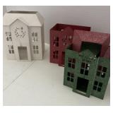 Trio of candle holding Christmas buildings one